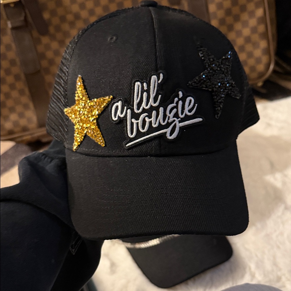 A Lil' Bougie Black Cap with Gold and Black Stars
